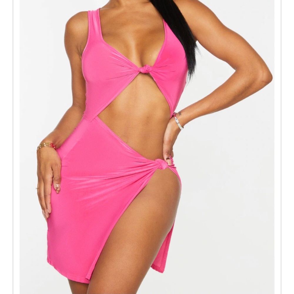 Pink cut out dress with side split.